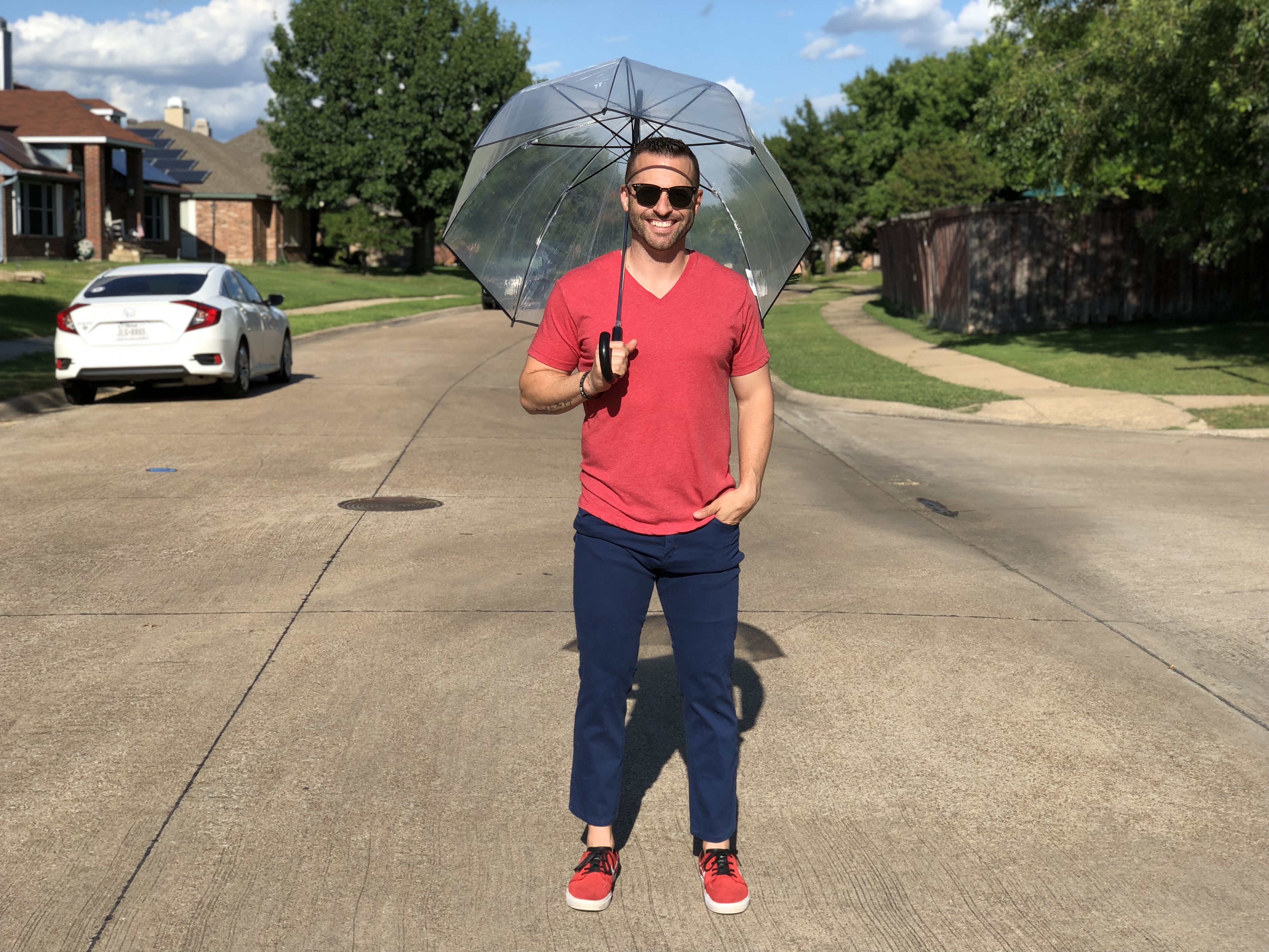 Jake Thompson Holding Umbrella