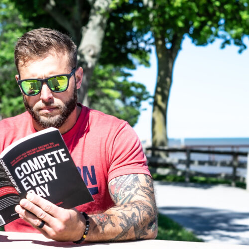 A Man Reading Compete Every Day Book